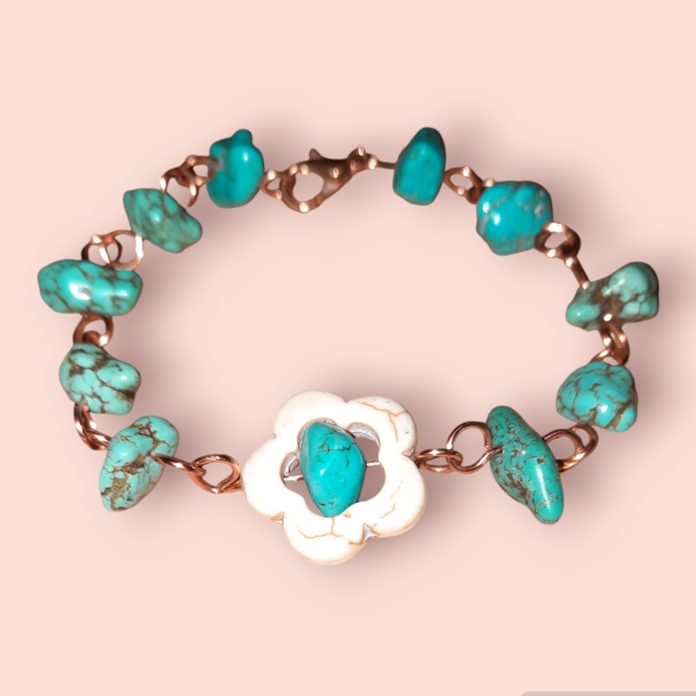 Handmade gemstone beaded bracelet coppery clasp and wires.